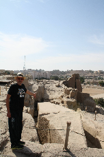 The Unfinished Obelisk with admirer, Aswan, Egypt, a must see during any vtour of Aswan Egypt